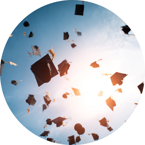 Graduation caps in the sky